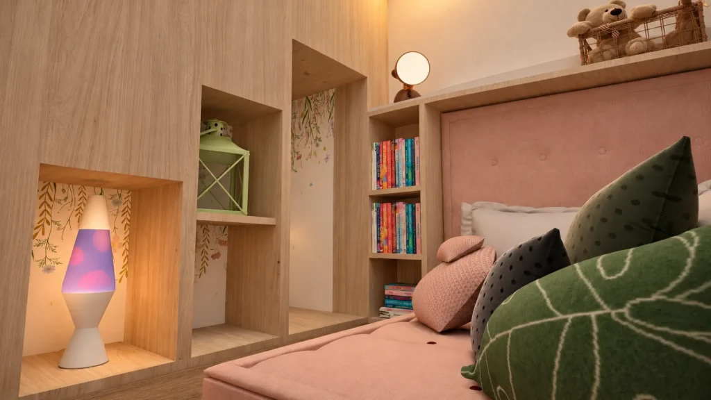 Zona de calma infantil con banco acolchado, cojines, librería y nichos de madera iluminados